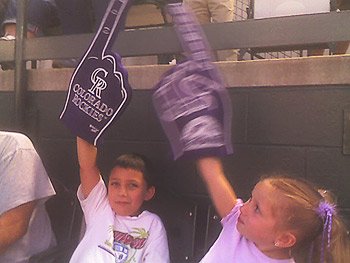 Brennan and Abby chearing for the Rockies